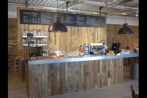 The cafe draws shoppers  through the store